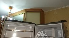 Работа по перевешиванию дверей на холодильнике