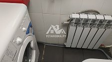 Установить в подсобном помещении новую отдельностоящую стиральную машину Indesit