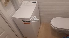 Установить на готовые коммуникации в ванной стиральную машину Hotpoint-Ariston