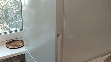 Перенавесить двери холодильника