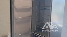 Перенавесить двери холодильника
