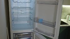 Перенавесить двери холодильника