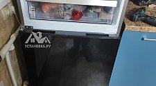 Перевесить двери холодильника