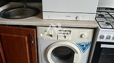 Установить отдельно стоящую на кухне новую стиральную машину