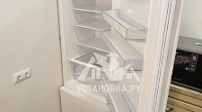 Перенавесить двери холодильника