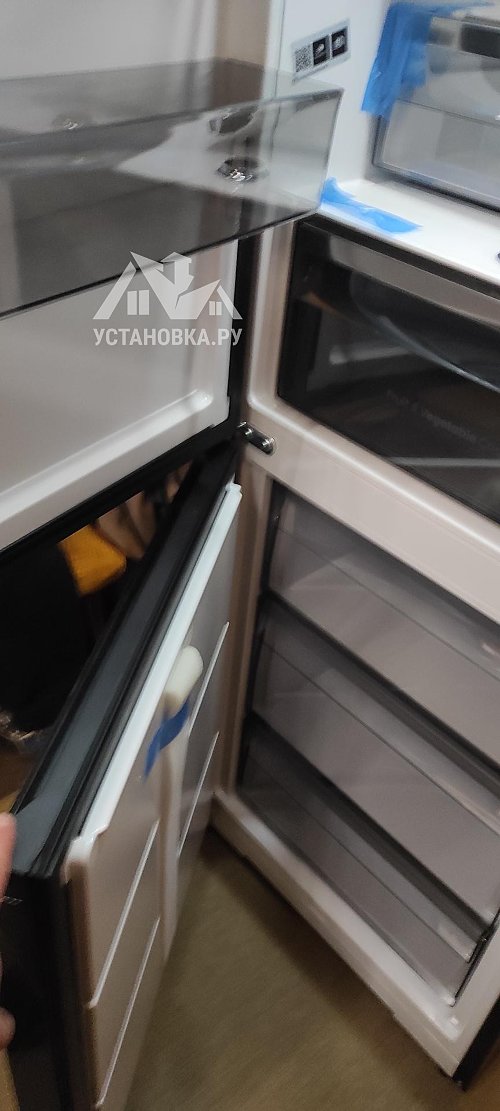 Перенавесить двери холодильника