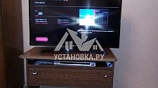 Установить на телевизионную тумбу и настроить новый телевизор LG