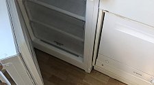Перевесить дверь холодильника