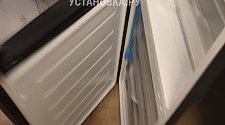 Перенавесить двери холодильника
