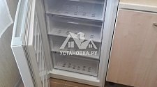 Перевесить  в районе Беляево  двери на холодильнике