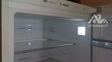 Выставить по уровню холодильник Bosch