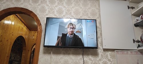 Повесить телевизор