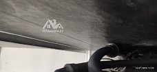 Повесить телевизор