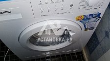 Установить новую отдельностоящую в ванной стиральную машину Атлант