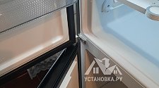 Перенавесить двери холодильника