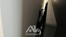 Повесить телевизор
