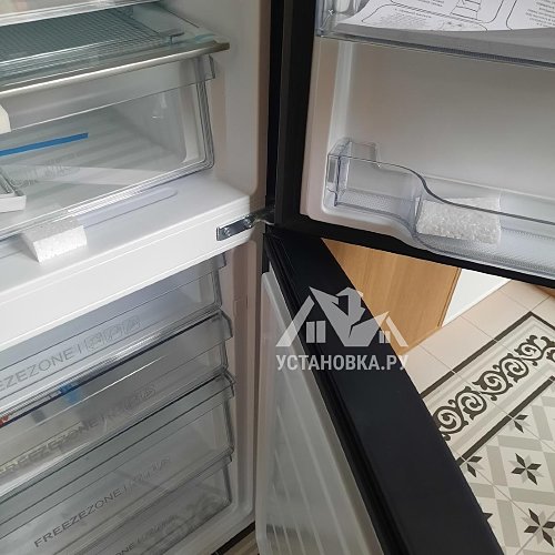 Перенавесить двери холодильника