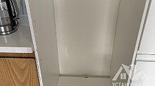 Установить встраиваемый холодильник и перенавесить на нём двери