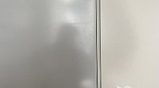 Установить встраиваемый холодильник и перенавесить на нём двери