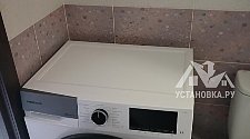 Установить стиральную и сушильную машину в колонну