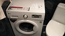 Установить стиральную машину LG в ванной комнате на готовые коммуникации