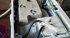 Установить отдельностоящую стиральную машину.
