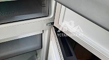 Перенавесить двери холодильника
