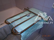 Работа по установке и подключению электрического полотенцесушителя в ванной комнате