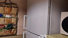 Перенавесить двери холодильника