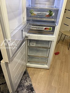 Перенавесить двери холодильника