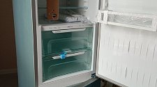 Установить холодильник и перевесить на нём двери