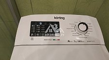 Установить отдельностоящую стиральную машину Kоrting в ванной на готовые коммуникации