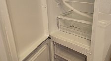 Перенавесить двери холодильника