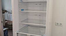 Перенавесить двери холодильника