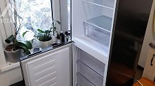 Перевесить двери холодильника