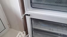 Перенавесить двери холодильника
