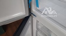 Перенавесить двери холодильника