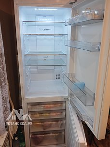 Перенавесить двери холодильника