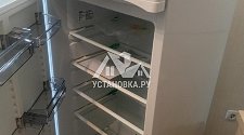Перенавесить двери холодильника