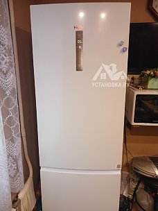 Перенавесить двери холодильника