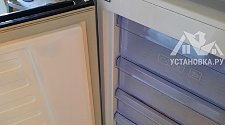 Установить холодильник отдельностоящий и перенавесить двери