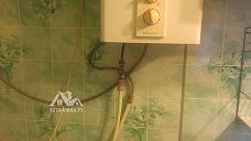 Установка водонагревателя и вытяжки на кухне