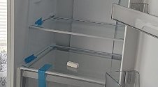 Перенавесить двери холодильника