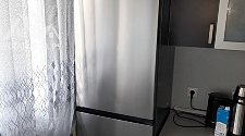 Перенавесить двери холодильника