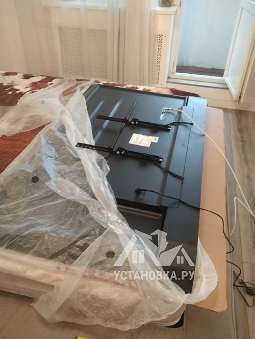 Подвесить и настроить телевизор