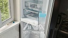 Перенавесить двери холодильника