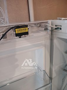 Перенавесить двери холодильника