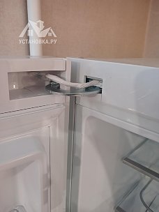 Перенавесить двери холодильника