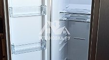 Установить на кухне новый отдельностоящий холодильник