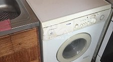 Демонтировать и установить отдельно стоящую стиральную машину Электролюкс на кухне